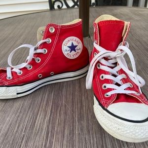 Red converse high tops
